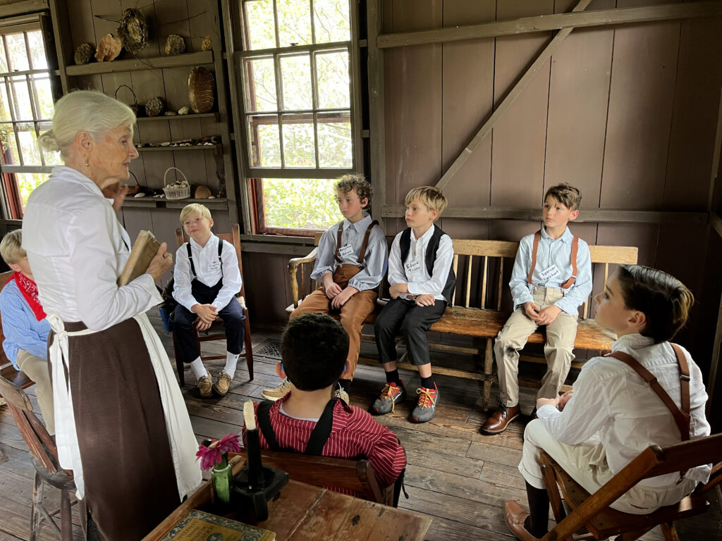 Rosarian 4th graders attend the Little Red Schoolhouse
